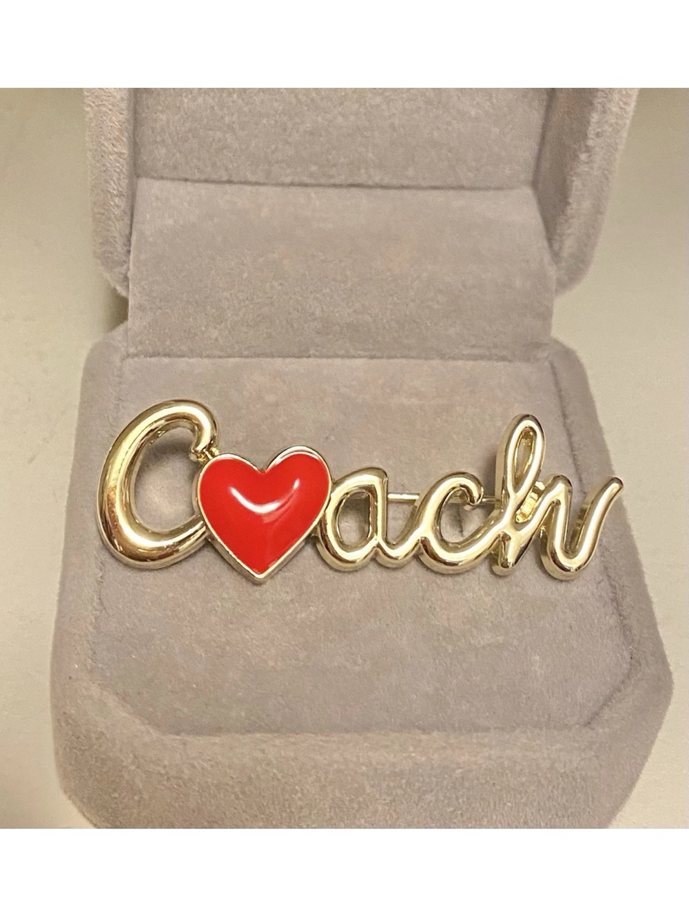 Coach Gold Script Logo Brooch with Red Heart Accent